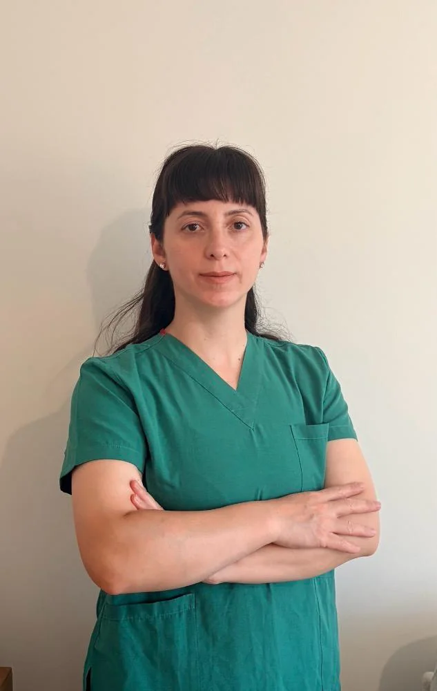 Portrait of Evsen Taskum, Chartered Physiotherapist